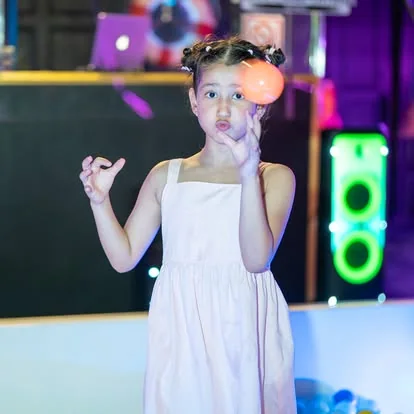 A young guest enjoying the Black Cruise Pattaya experience