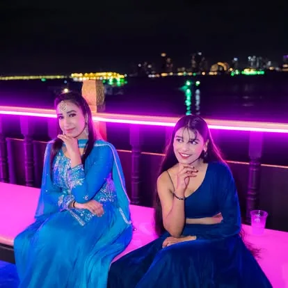 Guests dressed up on the Black Pearl deck at a night party in Pattaya